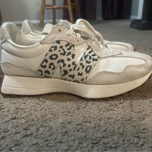 Woman’s new balance 327 size 9.5. Leopard logo